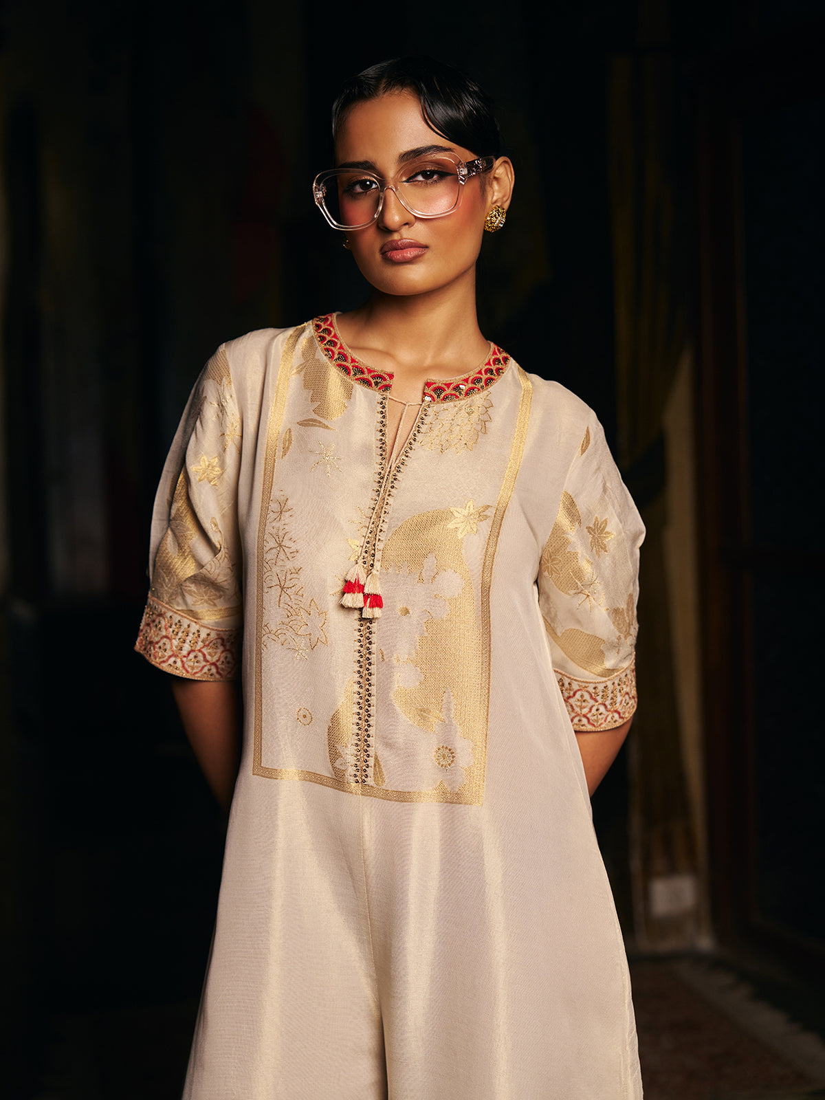 Cream womens designer silk jumpsuit with embroidered neckline