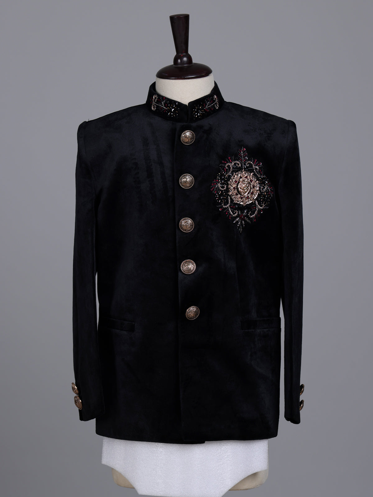 Black velvet boys jodhpuri suit with regal crest detailing