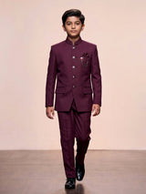 Wine boys jodhpuri suit with jacquard texture and metallic brooch