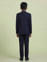 Navy boys jodhpuri suit with embellished crest motif for celebrations