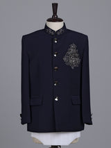 Navy boys jodhpuri suit with embellished crest motif for celebrations