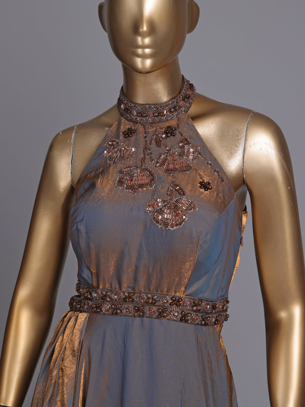Pastel blue metallic tissue silk anarkali with embellished halter neckline