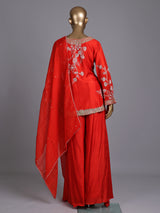 Orange raw silk palazzo suit with zardosi and aabla embellished dupatta