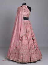 Pastel pink silk lehenga choli with embellished festive detailing
