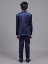 Navy velvet boys Jodhpuri suit with ornate crest detailing