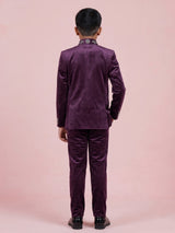 Wine velvet boys Jodhpuri suit with handcrafted crest motif