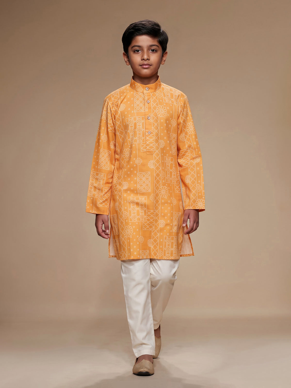 Light orange boys linen kurta suit with bandhani print