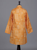 Light orange boys linen kurta suit with bandhani print