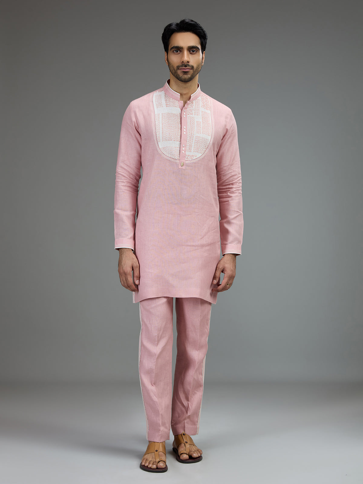 Pink charming mens kurta pajama with embroidered details