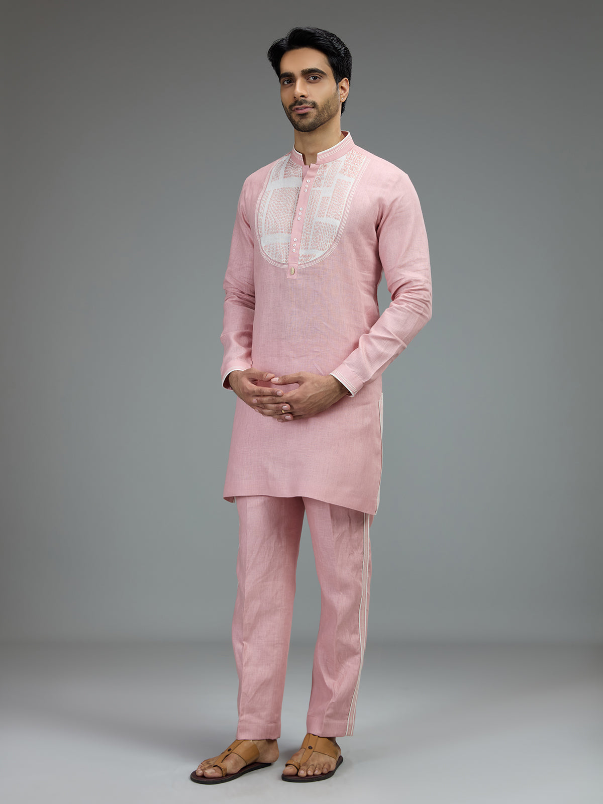 Pink charming mens kurta pajama with embroidered details