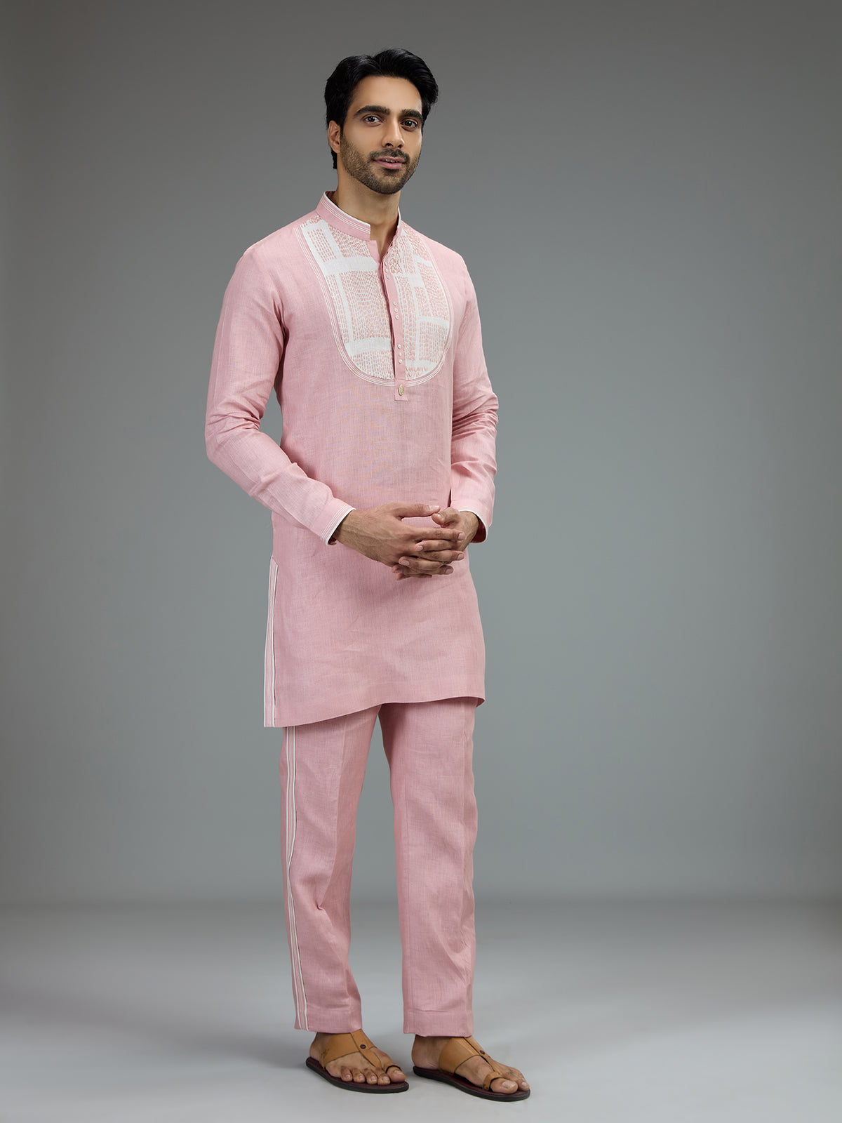 Pink charming mens kurta pajama with embroidered details