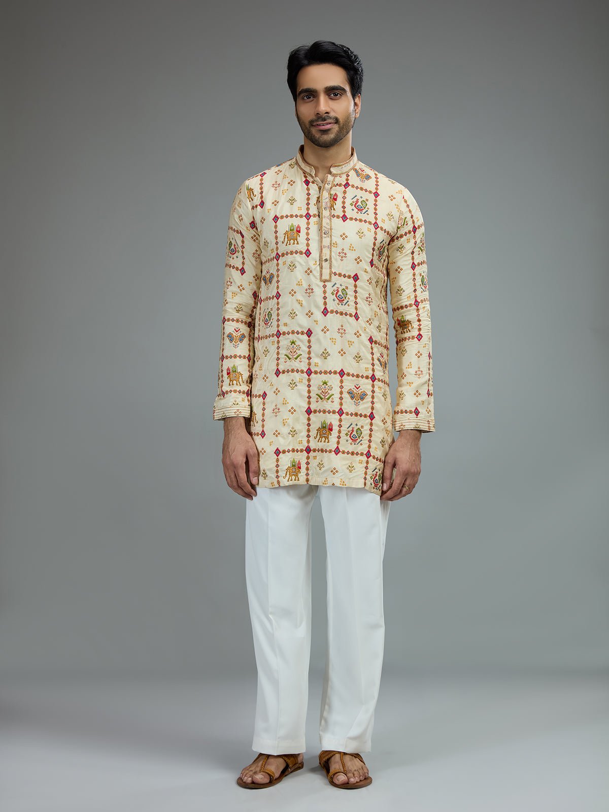 Cream traditional mens kurta pajama with royal prints