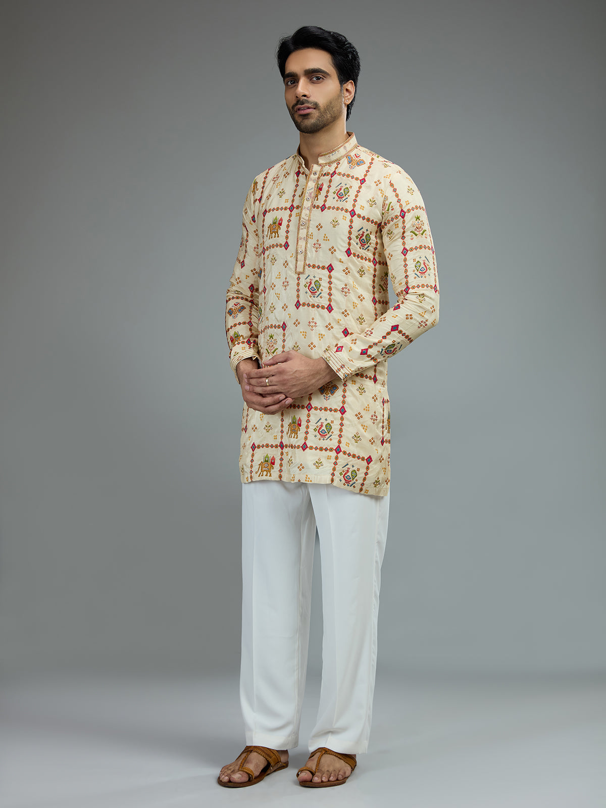 Cream traditional mens kurta pajama with royal prints