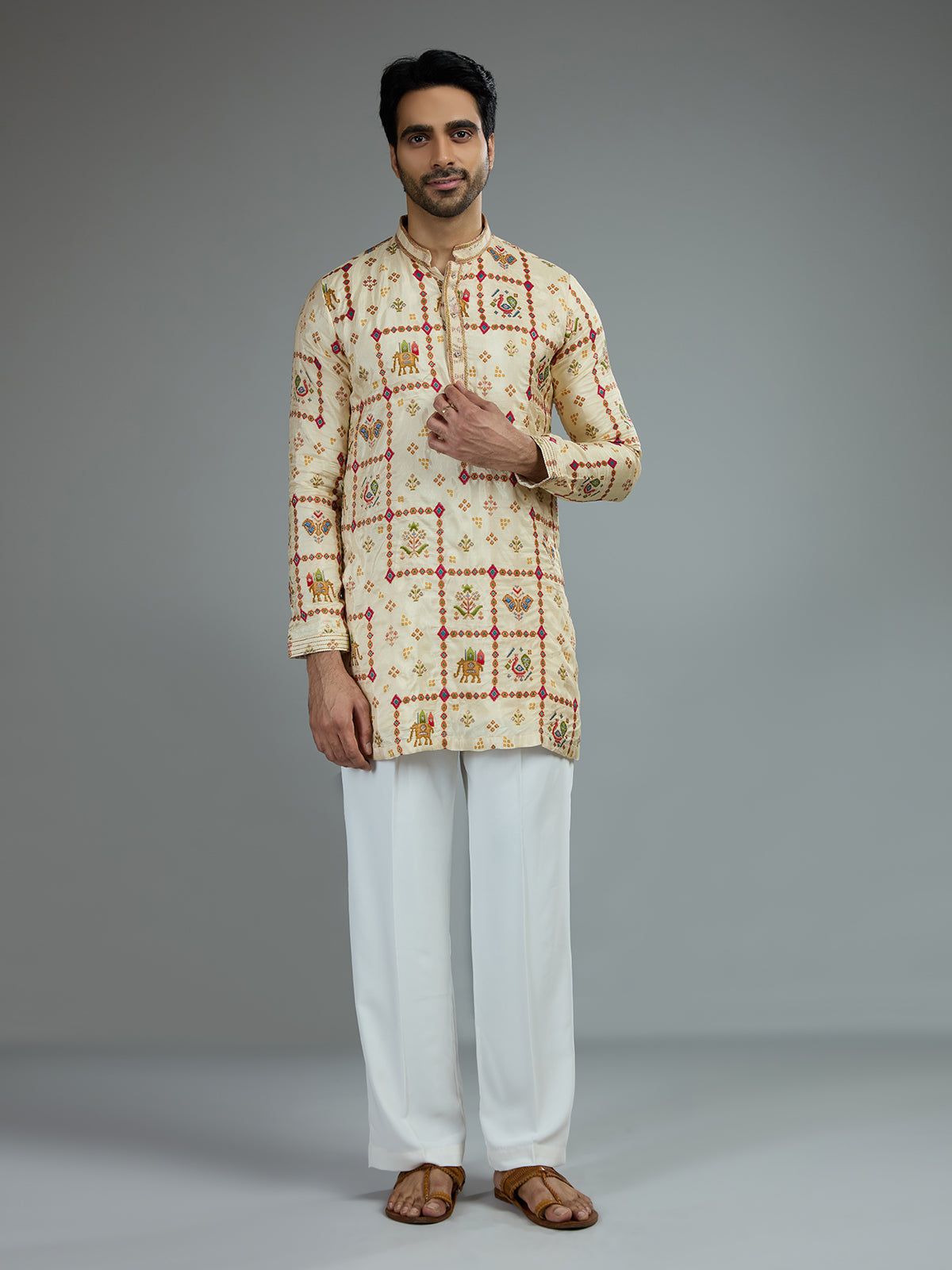 Cream traditional mens kurta pajama with royal prints