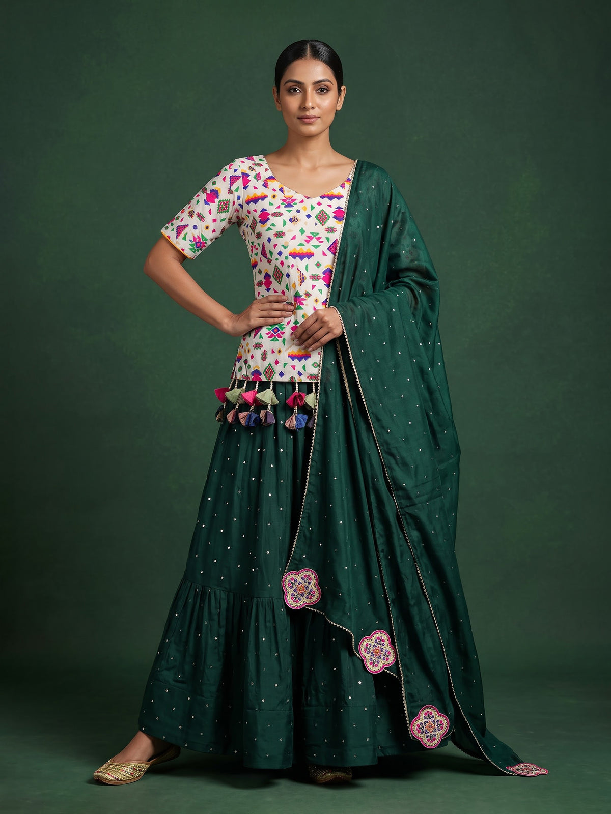 Dark green soft silk Navratri lehenga choli with stone detailing