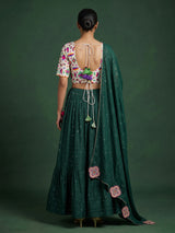 Dark green soft silk Navratri lehenga choli with stone detailing