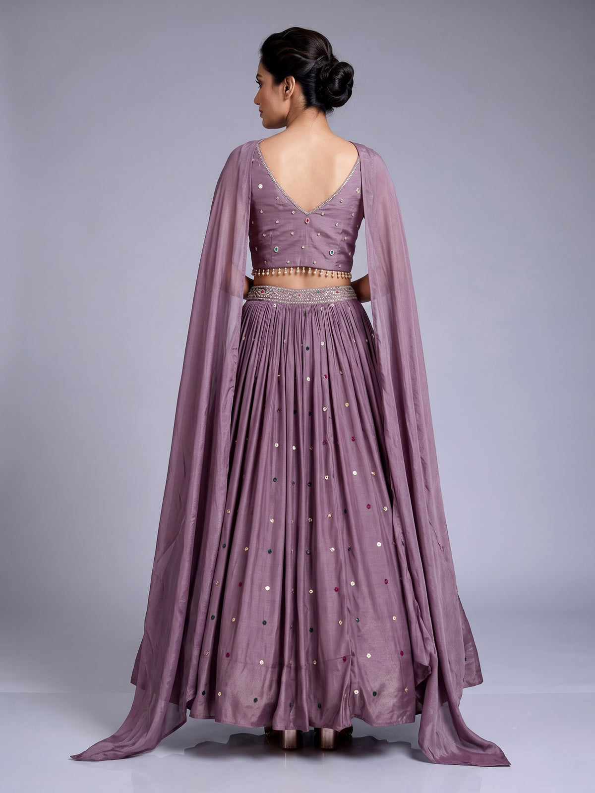 Purple silk wedding lehenga choli with dazzling diamond embellishments