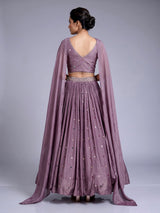 Purple silk wedding lehenga choli with dazzling diamond embellishments