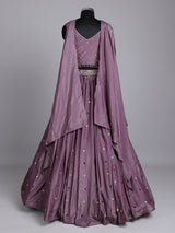 Purple silk wedding lehenga choli with dazzling diamond embellishments