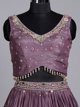 Purple silk wedding lehenga choli with dazzling diamond embellishments