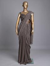 Brown designer net saree with zardosi embellished blouse detailing