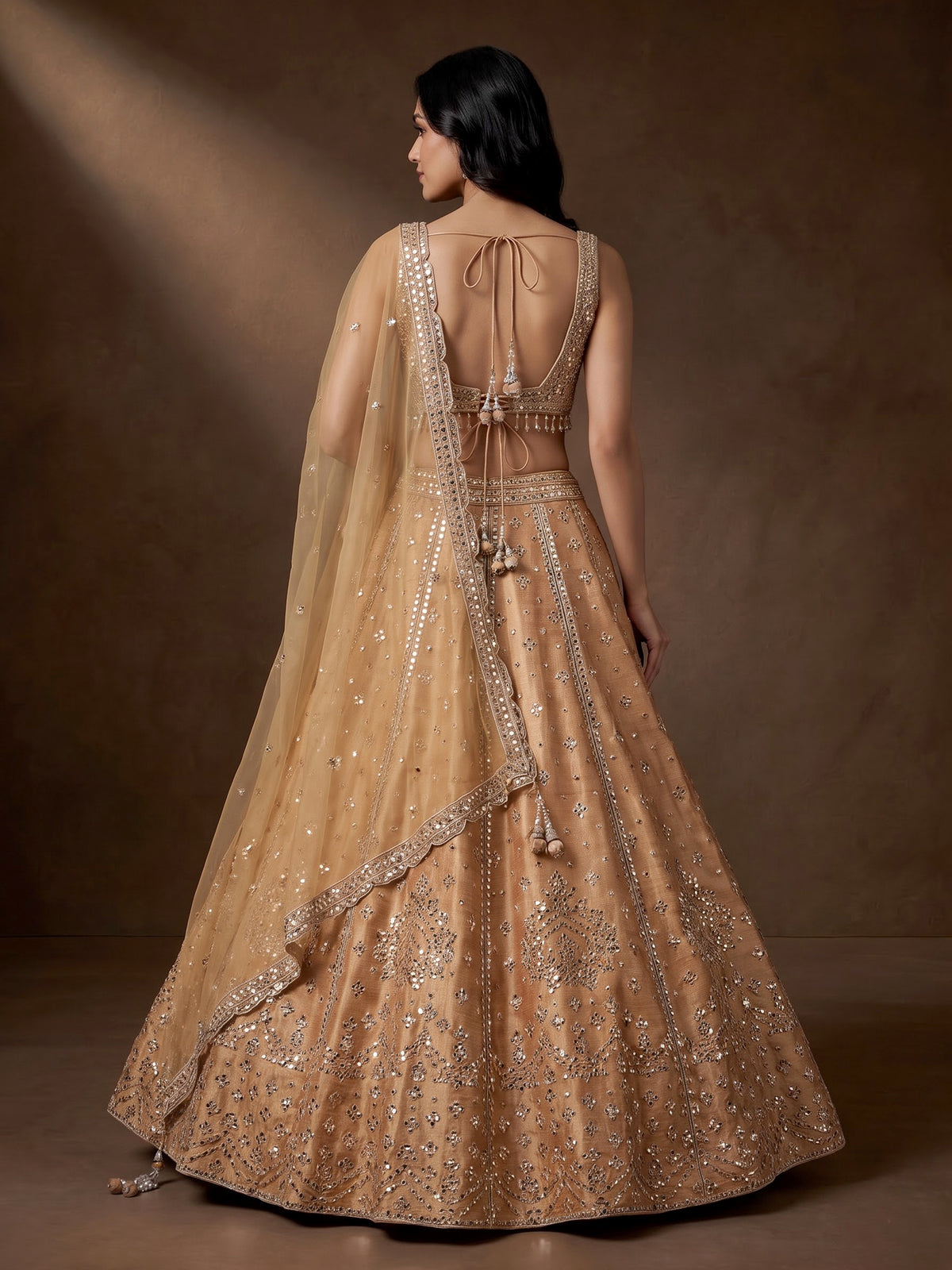 Peach raw silk lehenga choli with elegant diamond and aabla work