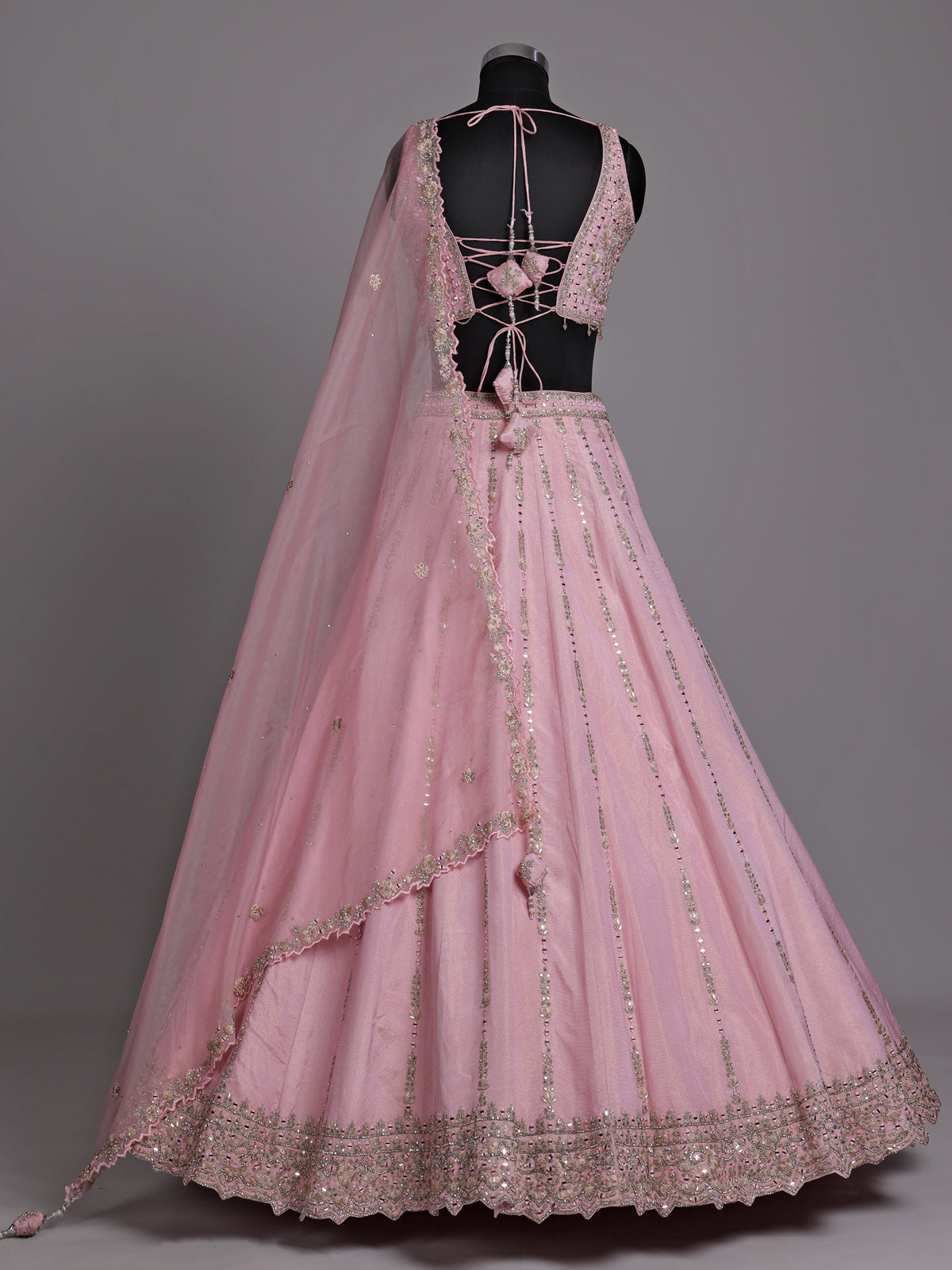 Pink silk lehenga choli with aabla diamond and tassel detailing