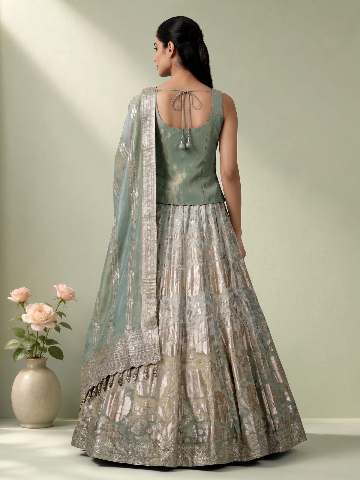 Pista green silk lehenga choli with mirror and zardosi work