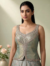 Pista green silk lehenga choli with mirror and zardosi work