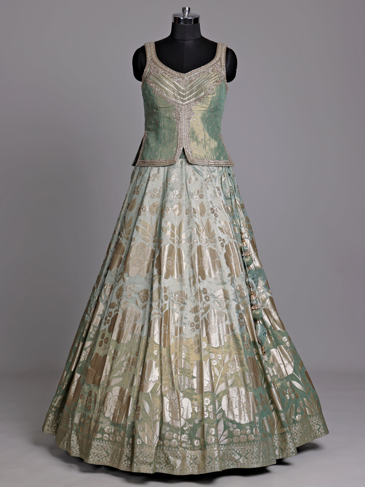 Pista green silk lehenga choli with mirror and zardosi work