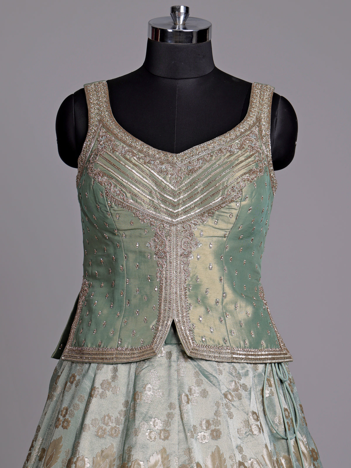 Pista green silk lehenga choli with mirror and zardosi work