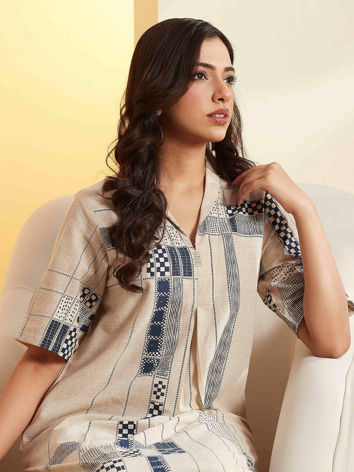 Beige a-line kurti set with printed detail
