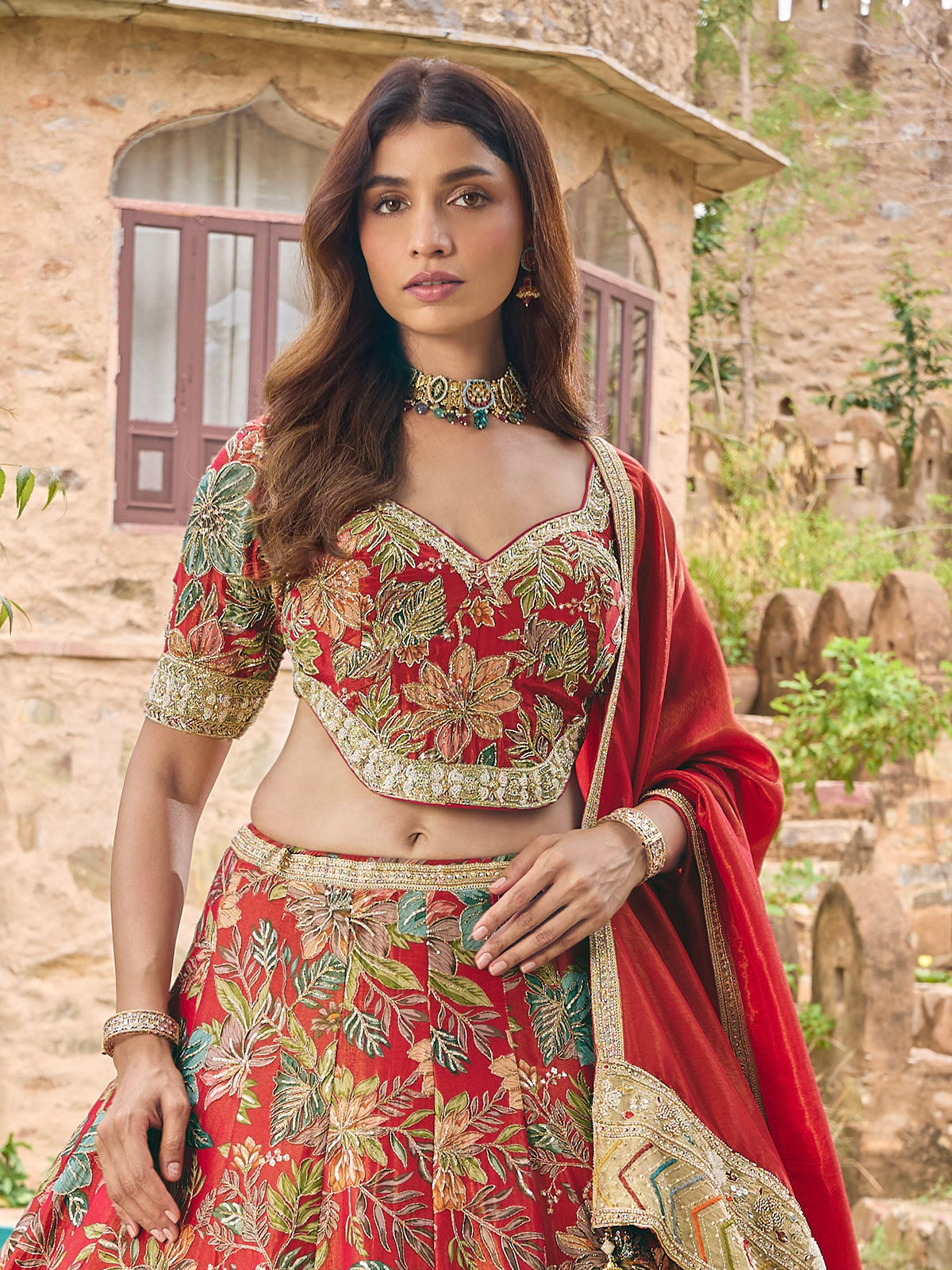 Red silk lehenga choli with floral embroidery and dupatta