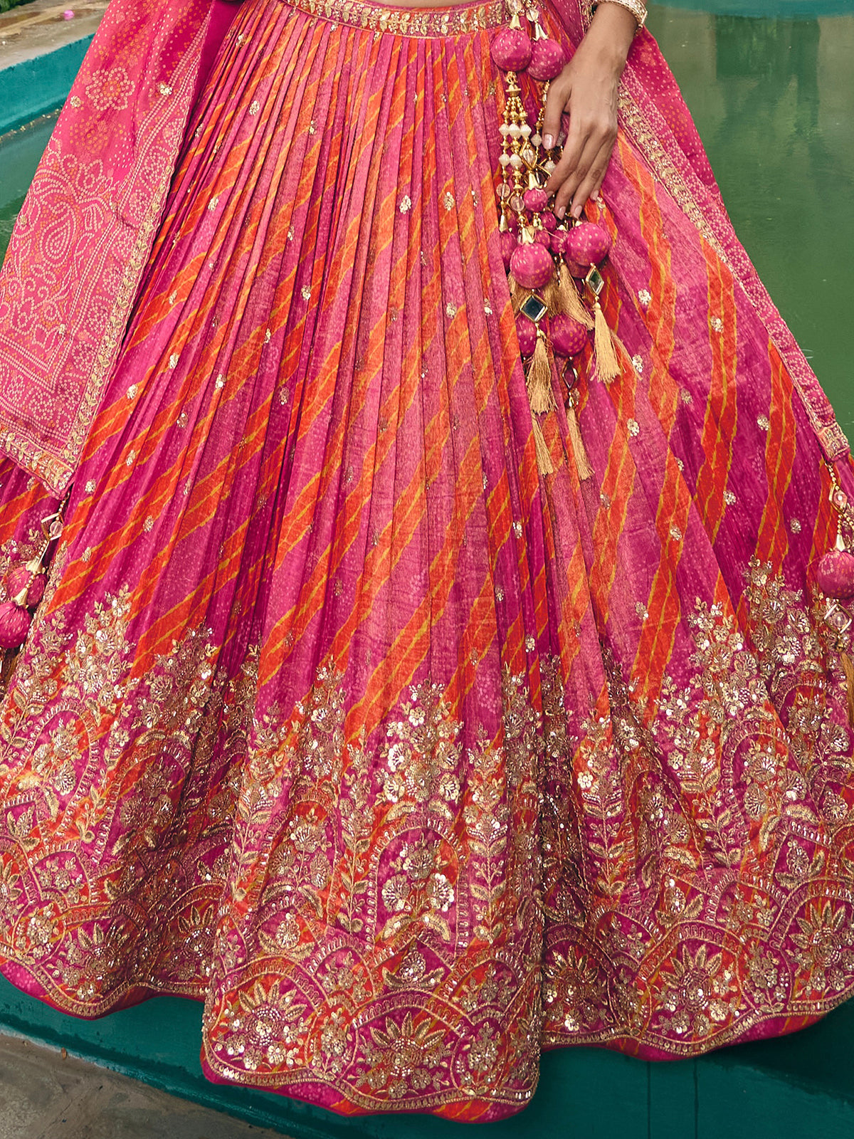 Rani pink silk lehenga choli with embellished dupatta