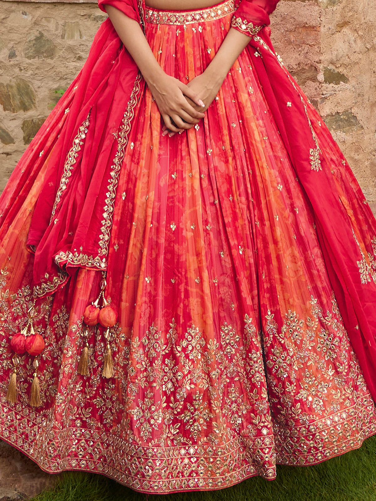 Redish pink silk lehenga choli with embellished dupatta