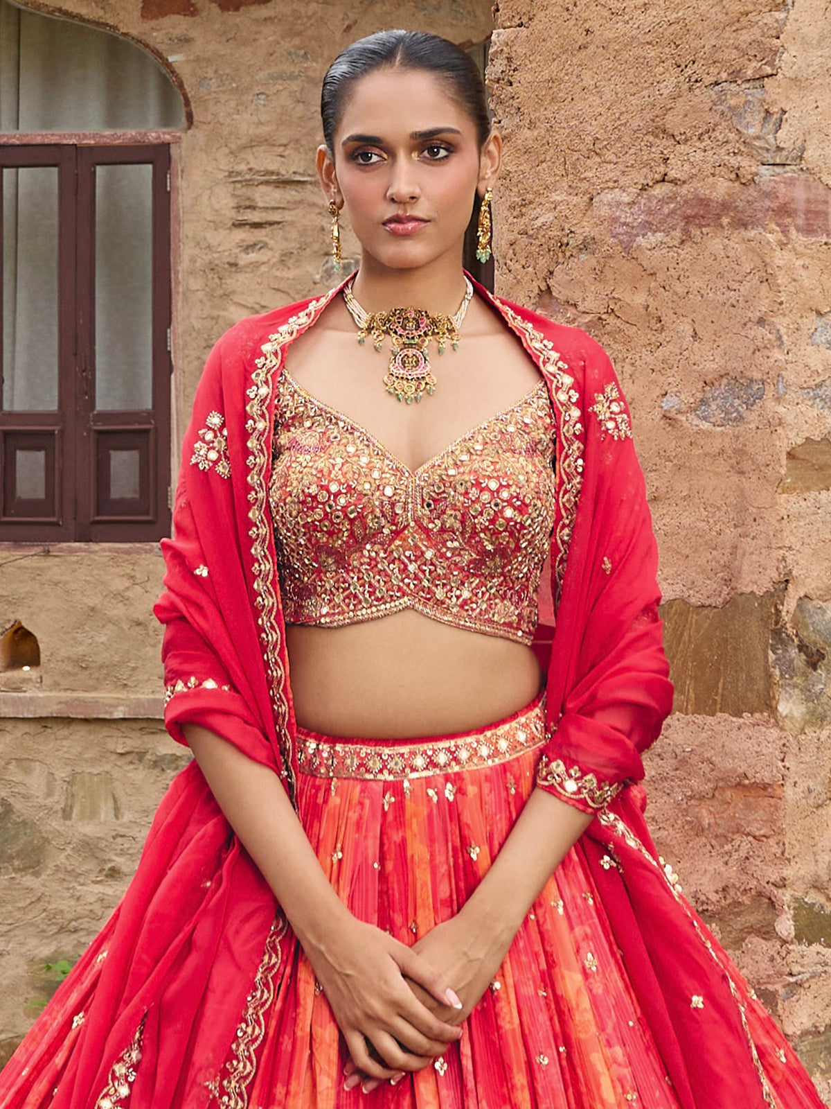 Redish pink silk lehenga choli with embellished dupatta