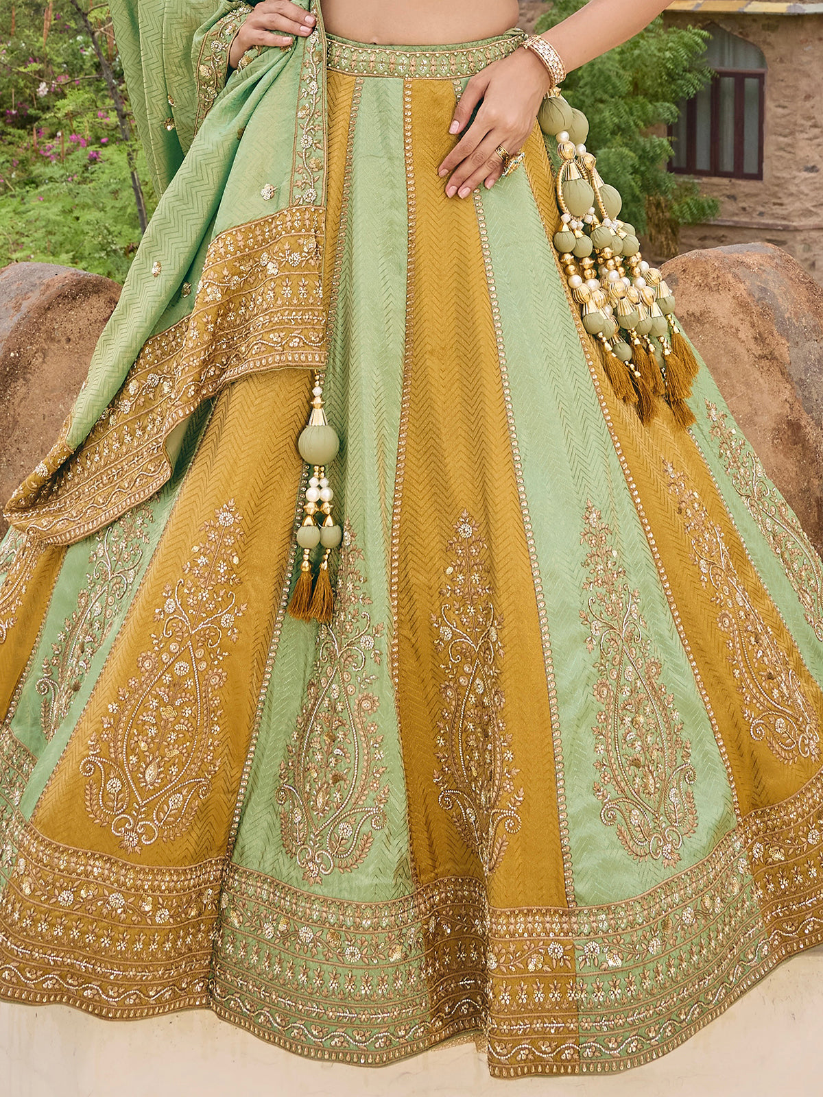 Mint green and gold silk lehenga choli with zig zag texture