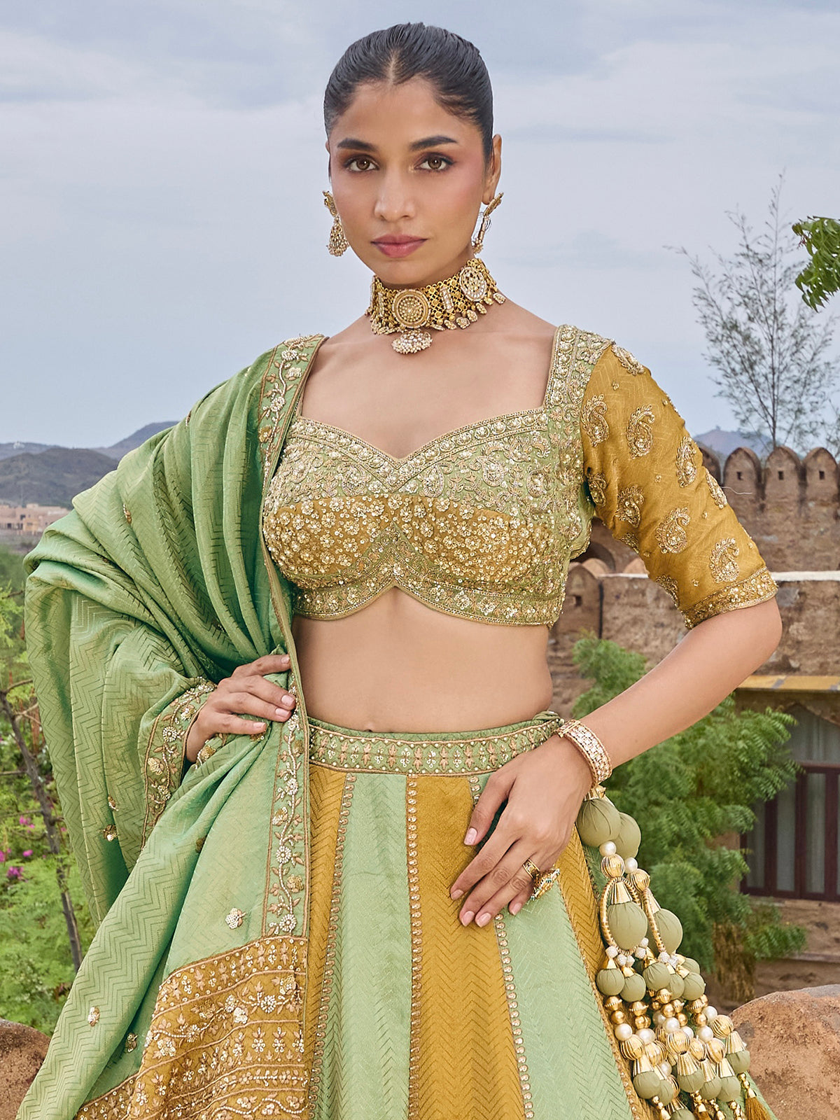 Mint green and gold silk lehenga choli with zig zag texture