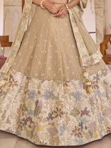 Beige tissue silk lehenga choli with embellished festive dupatta