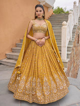 Mustard yellow silk lehenga choli with embellished dupatta