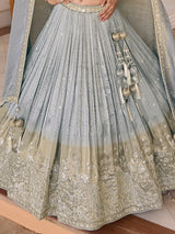 Light grey chiffon silk lehenga choli with peacock motifs