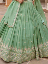 Pista green silk lehenga choli with embellished festive dupatta