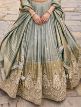 Grey silk lehenga choli with peacock motifs and shaded dupatta