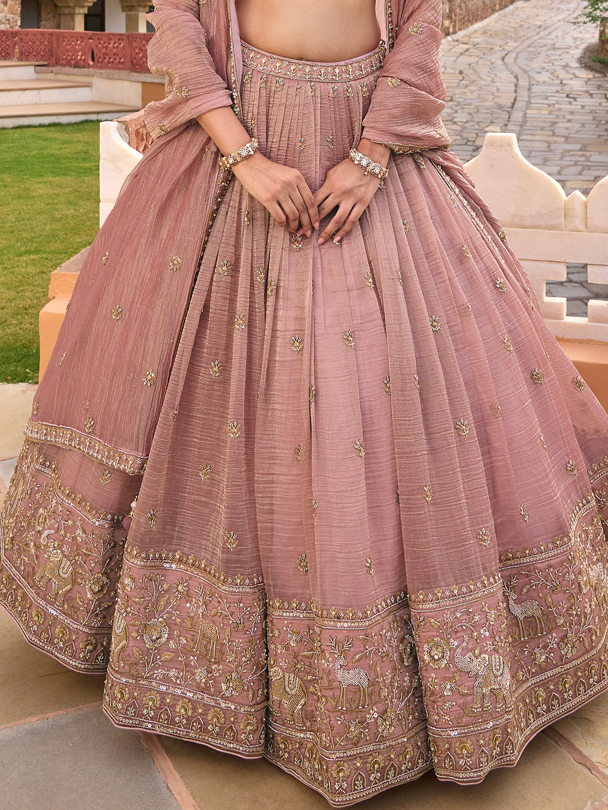 Onion pink chiffon silk lehenga choli with art motif detailing