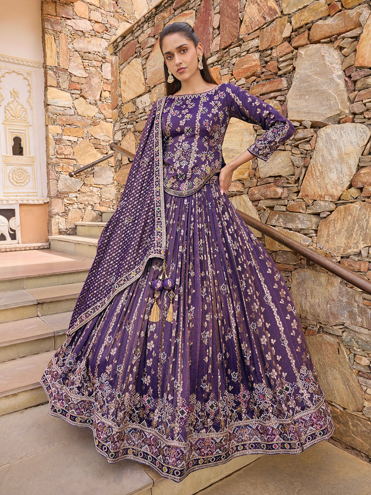 Purple silk lehenga choli with Rajasthani style embellished dupatta