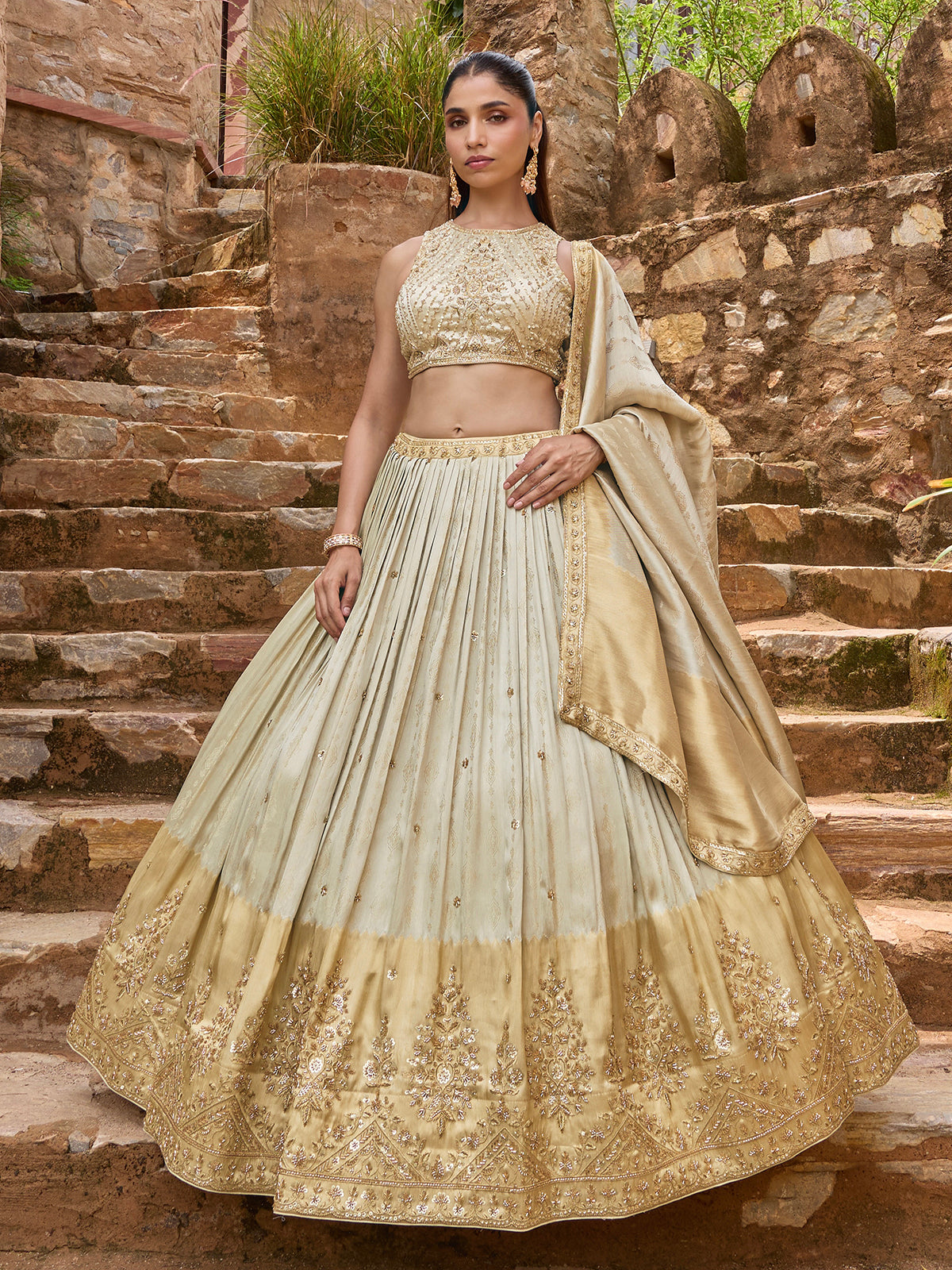 Cream silk lehenga choli with designer shaded embellished dupatta