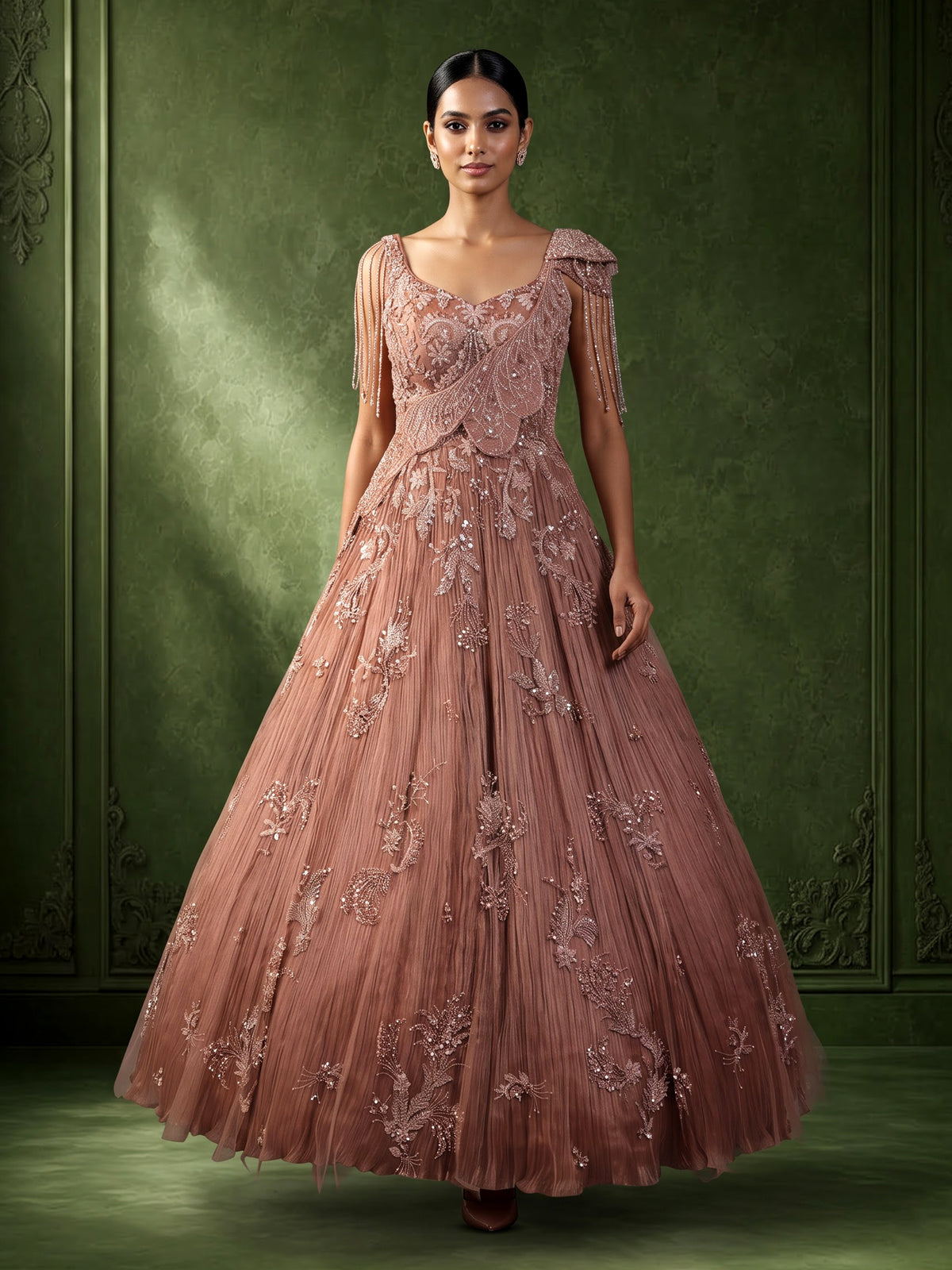 Dusty peach ball gown with floral embellishments and fringe