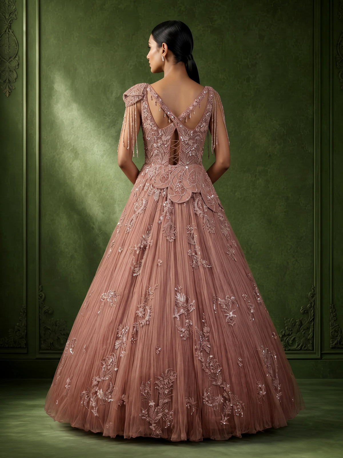 Dusty peach ball gown with floral embellishments and fringe