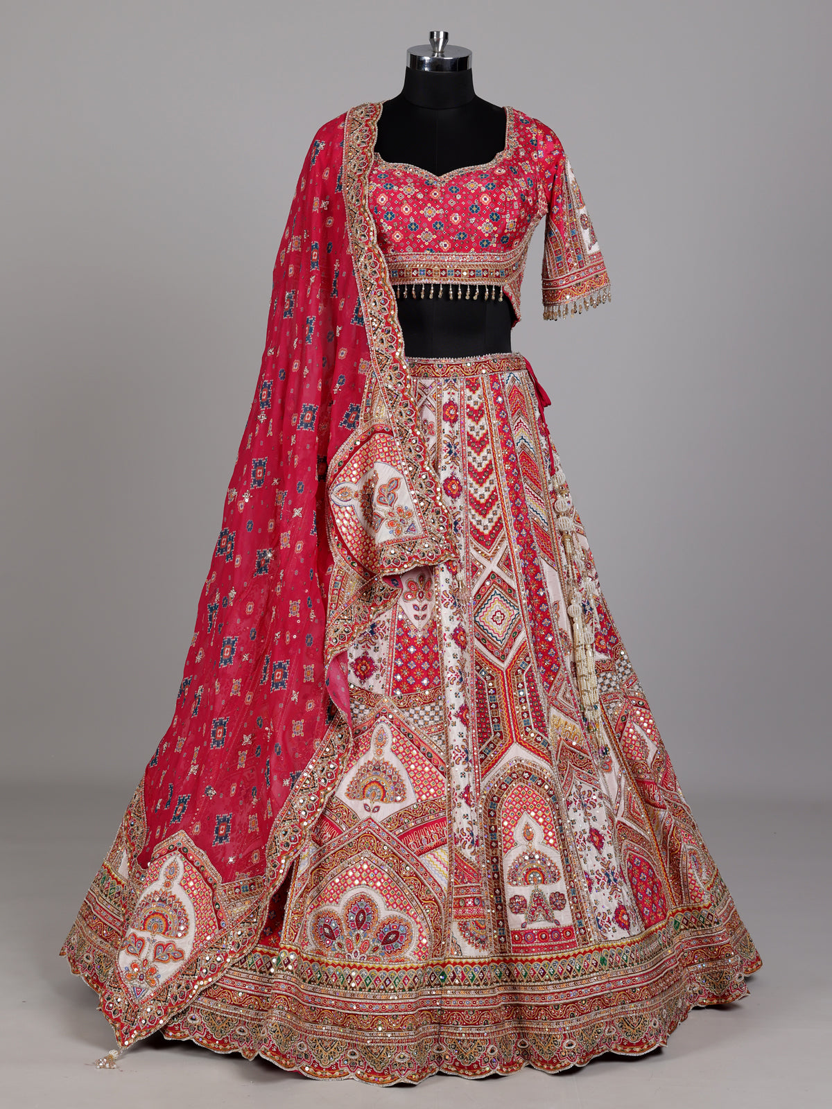 Red ivory lehenga choli with vibrant pink dupatta