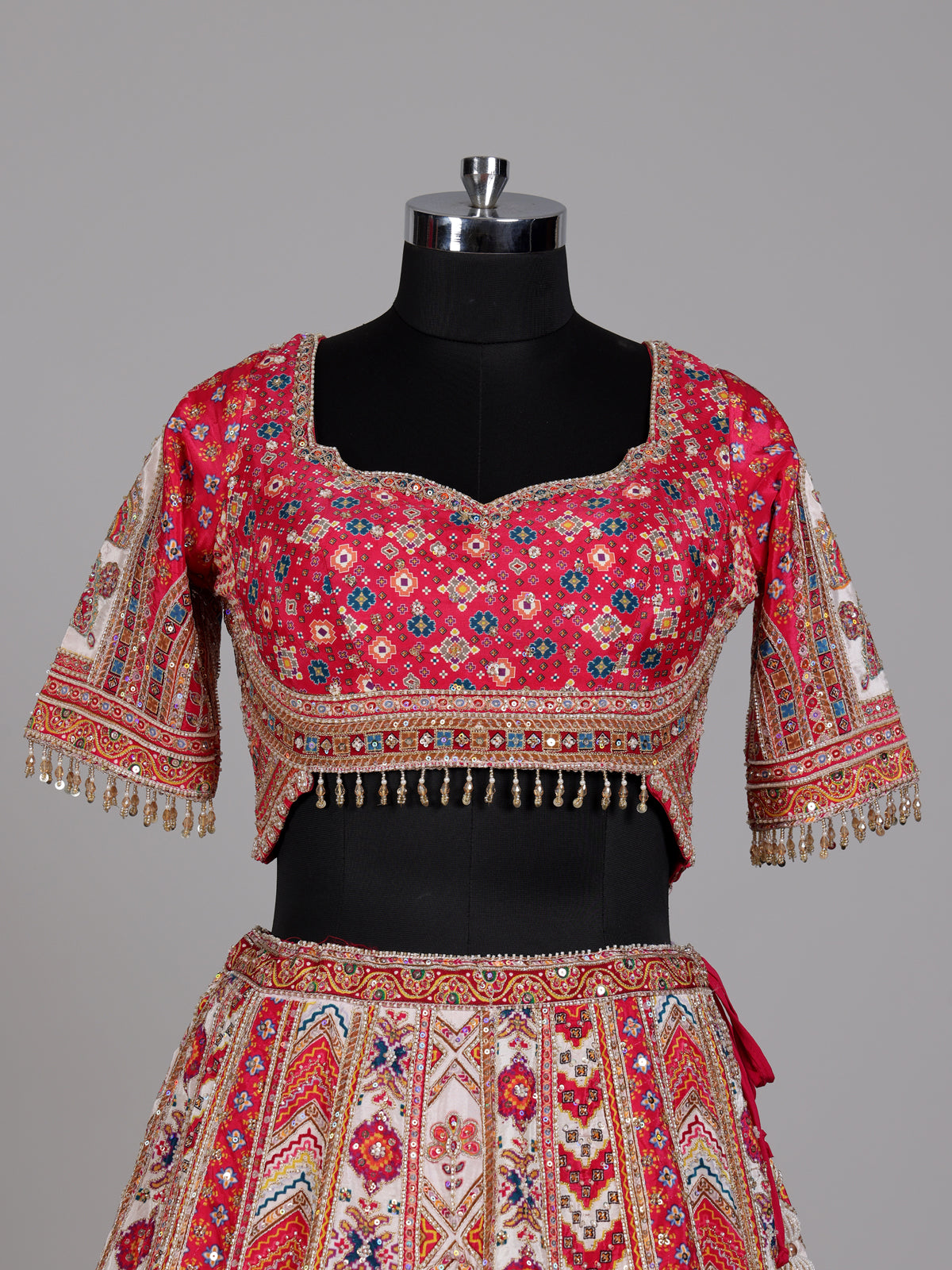 Red ivory lehenga choli with vibrant pink dupatta